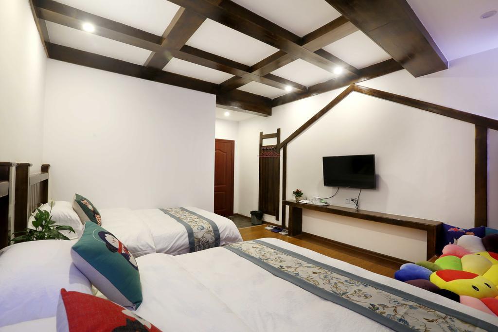 Bugu Hostel Wulingyuan Екстер'єр фото